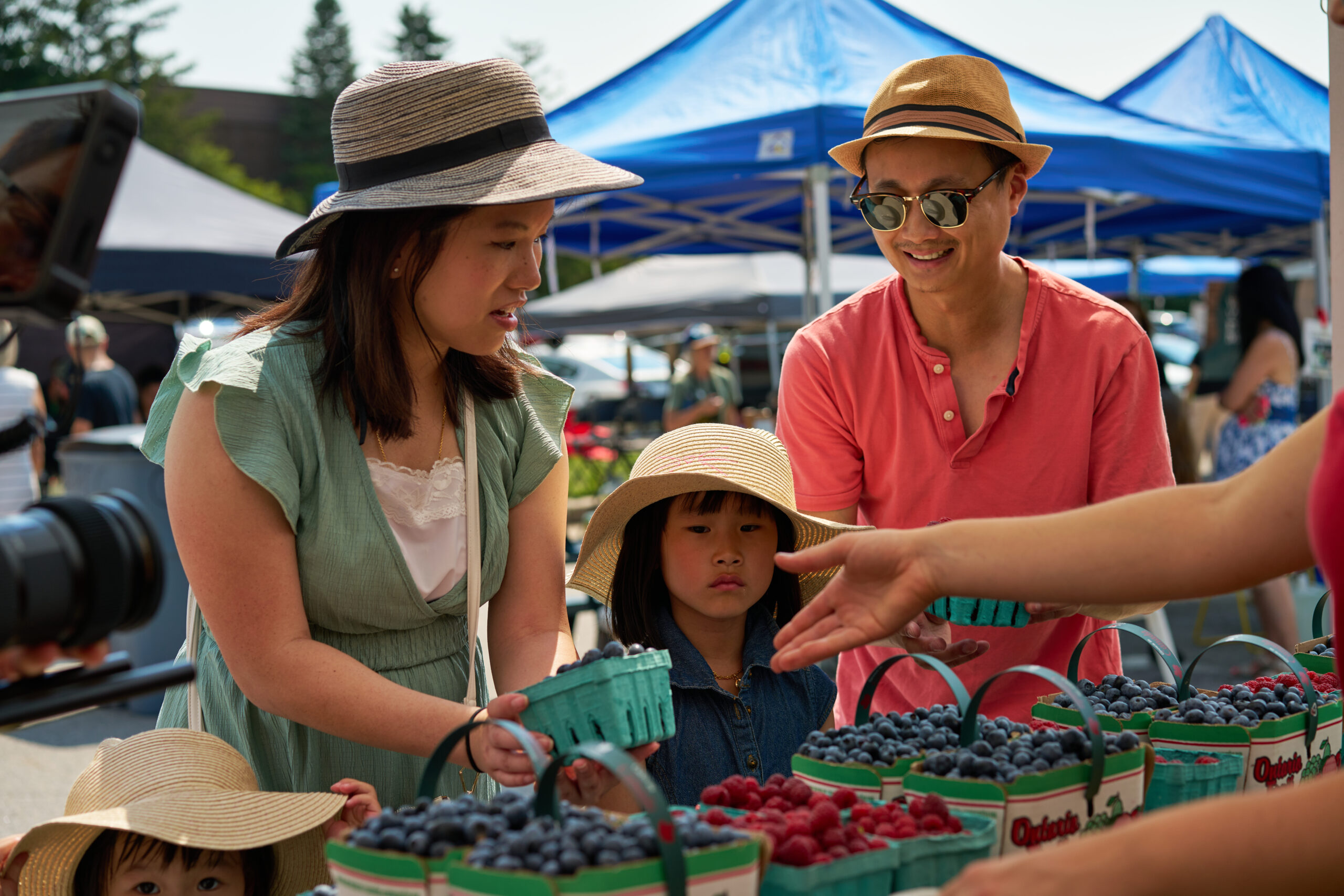 family at farmers market