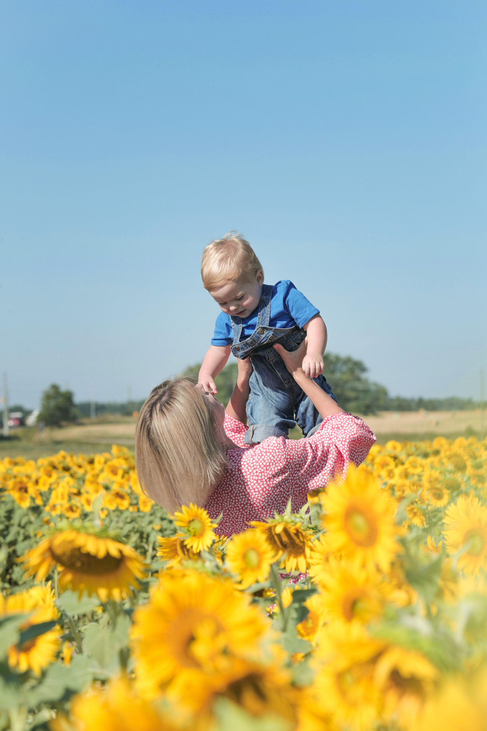 mother and baby in field