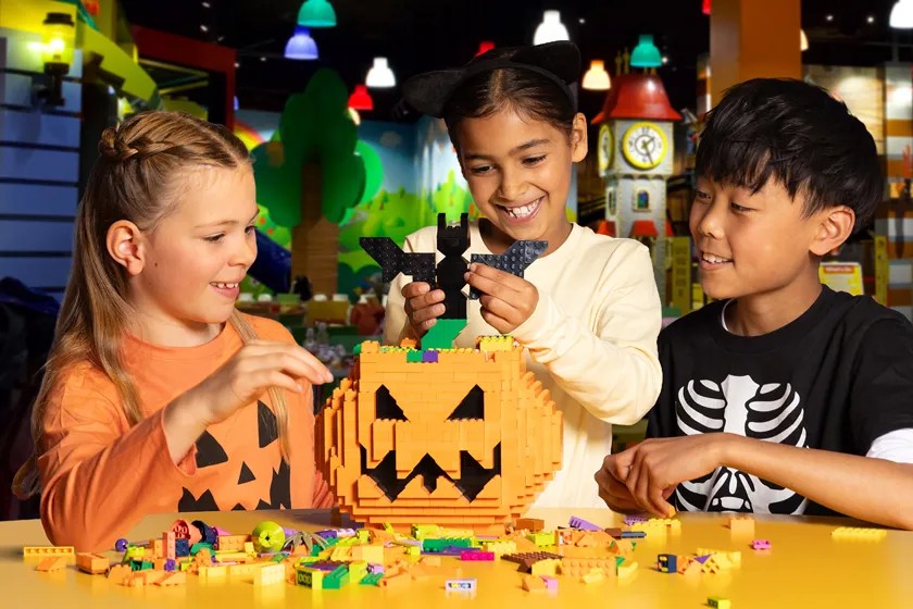 Children playing with Halloween theme LEGO